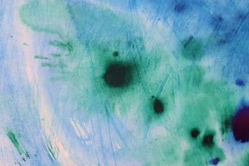 Acquerello su carta bianca, macchie di colore in varie tonalità di azzurro, blu e verde