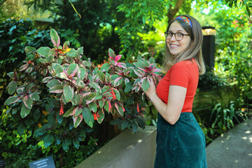 Woman botanist at work in a botanical garden