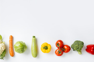 Fresh vegetables on a white background. Top view, flat lay