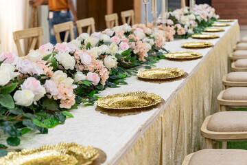 beautiful Wedding party decoration with flowers, lights, curtains, table, sofa, walkway etc.