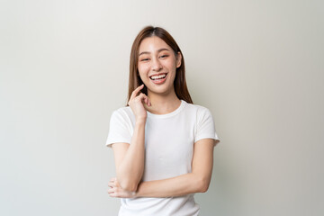 happy young asian woman smiling isolated on background.