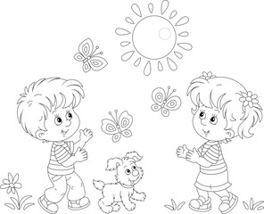 Happy little kids and their merry pup playing with colorful butterflies in a park on a sunny summer day, black and white outline vector cartoon illustration for a coloring book