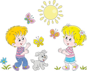 Fototapeta na wymiar Happy little kids and their merry pup playing with colorful butterflies in a park on a sunny summer day, vector cartoon illustration isolated on a white background