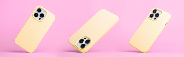 set of three iPhone 15 pro in yellow silicone case falling down in different angles, back view...