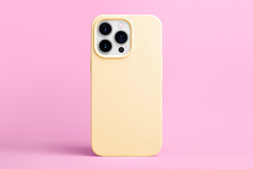 iPhone 15 Pro in yellow case back view isolated on pink background, phone case mock up