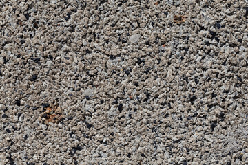 Crushed granite stones wall - close up