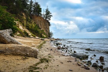 Beautiful landscape on the Polish Baltic Sea. Beach with stones and a beautiful cliff in Gdynia Orlowo, Poland. - 626632635