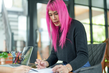 Asian transgender Pink Hair Working on Design Business Gender equality LGBTQ+ concept