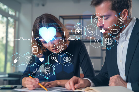 Businesspeople in formal wear taking notes signing contract at office workplace. Concept of important working moments, document sign, working process, concentration. Medical icons hologram
