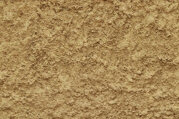Background, texture of a roughly plastered brown cement wall