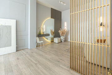 bright open-plan apartment in a modern design, light walls and wooden floor. stylish entrance hall...