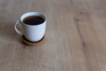 cup of tea on the wooden table