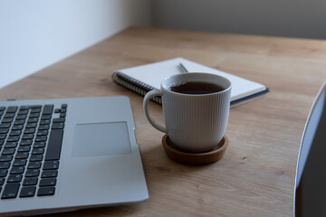 coffee cup and laptop