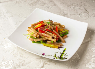 Shredded Pepper and Lotus Root served dish isolated on background top view of hong kong chinese food