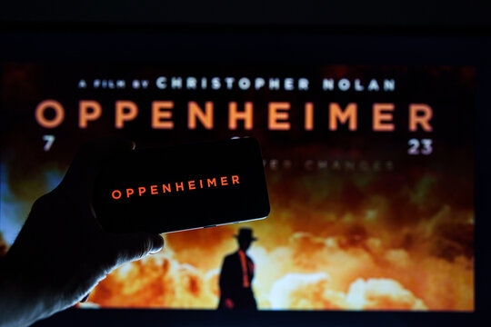 Oppenheimer Movie Logo And Poster On Screen