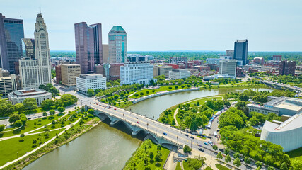 Bridge from Center of Science and Industry to skyscrapers in downtown Columbus Ohio aerial