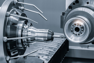 operator machining automotive parts by high precision machining center Drilling machine workpiece...