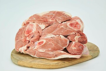 Raw meat on a white background. Pork, beef or lamb. Steak or tenderloin. Different parts of meat products for different dishes.