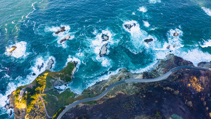 Fototapeta na wymiar Spectacular drone photo, top view of seascape ocean wave crashing rocky cliff. Beauty of the sea. Beaches where land and sea meet seascape. 