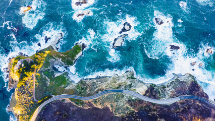 Fototapeta na wymiar Spectacular drone photo, top view of seascape ocean wave crashing rocky cliff. Beauty of the sea. Beaches where land and sea meet seascape. 