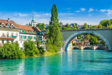 Old city center and Nydeggbrucke bridge over river Aare, Bern Switzerland.  - Powered by Adobe