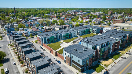 Condos downtown Fort Wayne pool courtyard enclosure cityscape housing architecture aerial