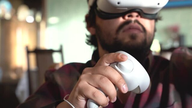 young male using virtual reality glasses