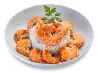 Fried shrimps with rice in white dish with parsley leaves, isolated