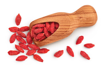 Dried goji berries in wooden scoop isolated on white background. Top view. Flat lay.