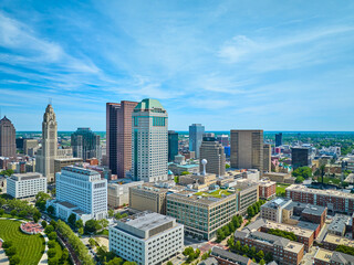 Blue sky with wispy clouds over downtown Columbus Ohio in summer aerial