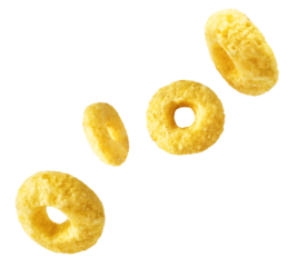 Tasty ring cereals falling in the air isolated.