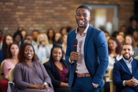 Younger African American man engaged in a first-time public speaking event, filled with genuine emotion and feelings
