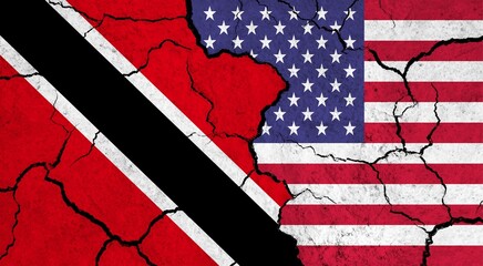 Flags of Trinidad and USA on cracked surface - politics, relationship concept