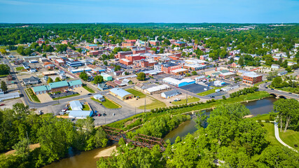 Aerial view of park area leading to wide view of Mount Vernon city in Ohio