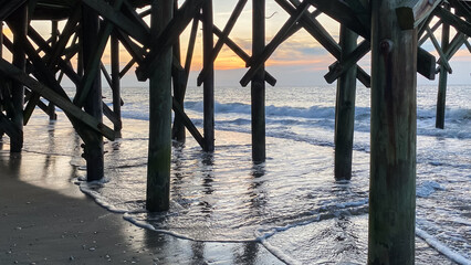 Pier with ocean waves in Myrtle Beach