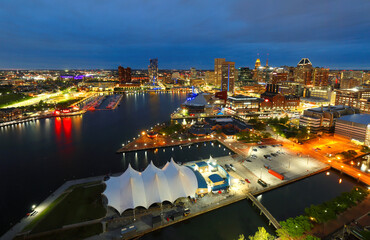 Bird's eye view of the Baltimore’s Inner Harbor after sunset, Maryland.  Baltimore is a major city in Maryland with a long history as an important seaport.