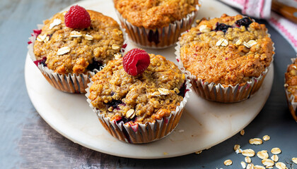 Vegan banana carrot muffins with oats and berries