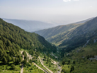 Naklejka premium Aerial view of road to Kalin Dam, Rila Mountain, Bulgaria