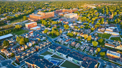 Summer sunrise city architecture houses, businesses, factory cityscape landscape neighborhood aerial