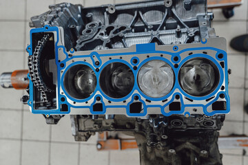 Installing a new cylinder head gasket in the engine