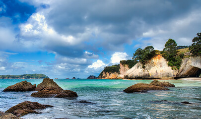 The golden beach and stunning  rock formations and archway  at Cathedral cove in the Coromandel NZ