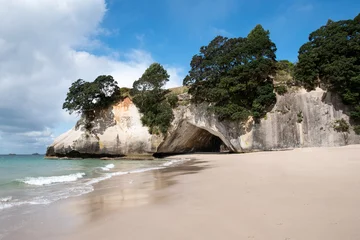 Zelfklevend Fotobehang The golden beach and stunning  rock formations and archway  at Cathedral cove in the Coromandel NZ © Stewart