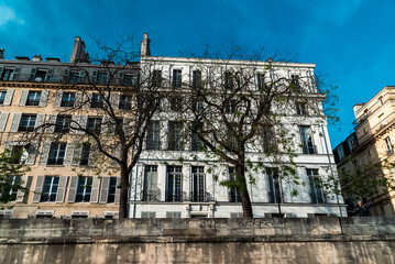 Paris, France. April 24, 2022: City architecture with houses and Seine river view
