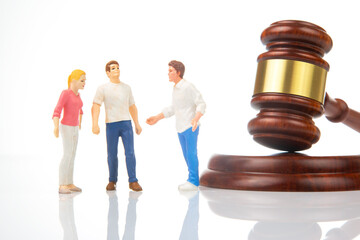 Miniature people. people solve dispute and relationship near gavel of law and justice. Laws to...