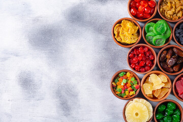 Group of dried and candied fruit in bowl