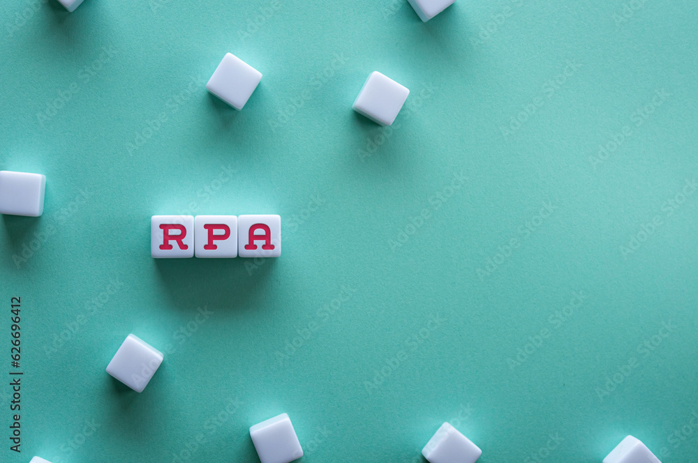 Poster there is white cube with the word rpa. it is an abbreviation for robotic process automation as eye-c
