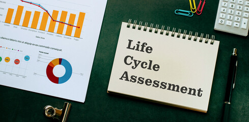 There is notebook with the word Life Cycle Assessment. It is as an eye-catching image.