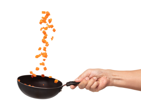 Carrot fresh fly float in Air turn to Cube dice shape. Beta Carotene orange color in Carrot is good health. Many Dice cube carrot flying throw up in Air by cooking pan. White background isolated