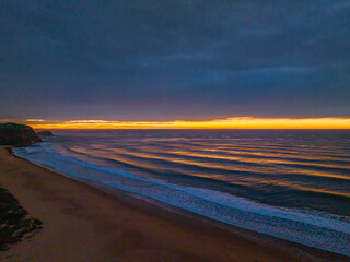 Fototapeta na wymiar Sunrise at the seaside and lagoon with cloud cover