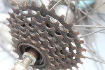 Rusted and old school bicycle sprocket gear. suitable for bicycle and industrial gear themes.